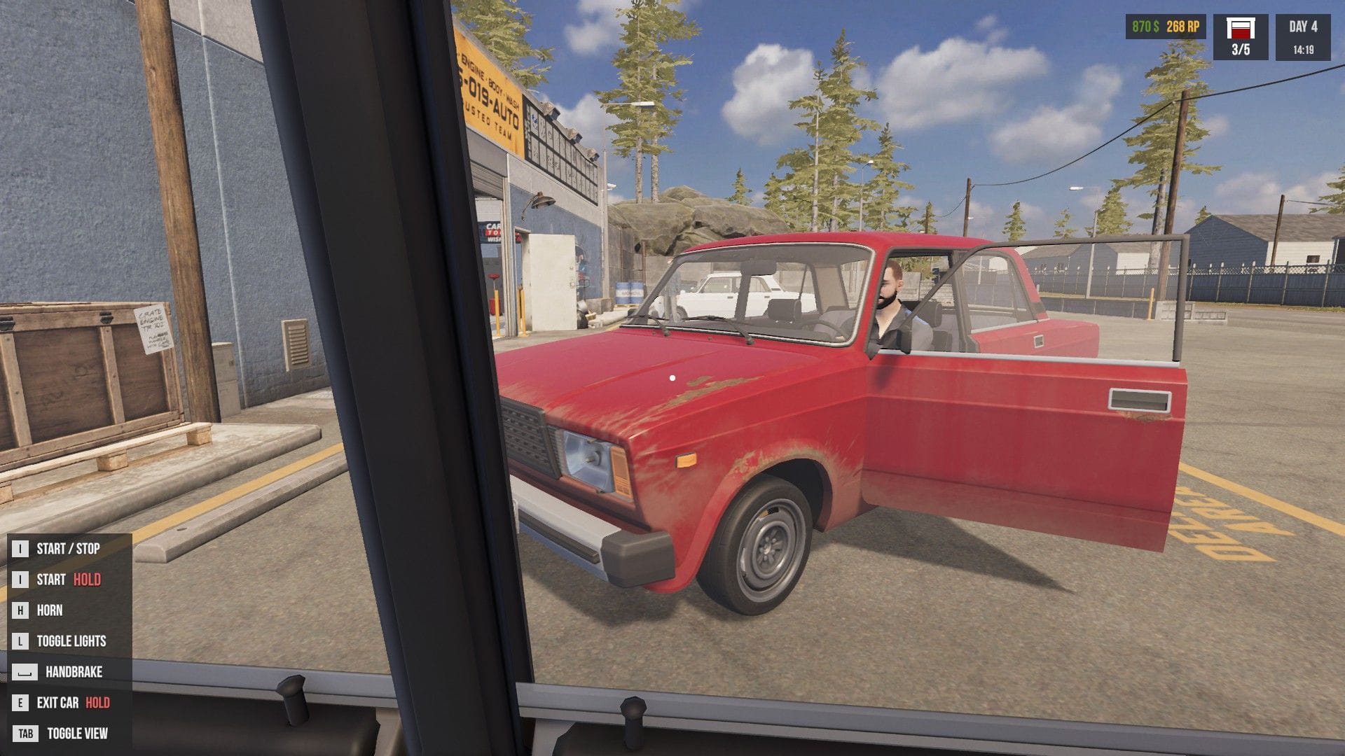 A red car with its door open, revealing Jonty inside, driving.