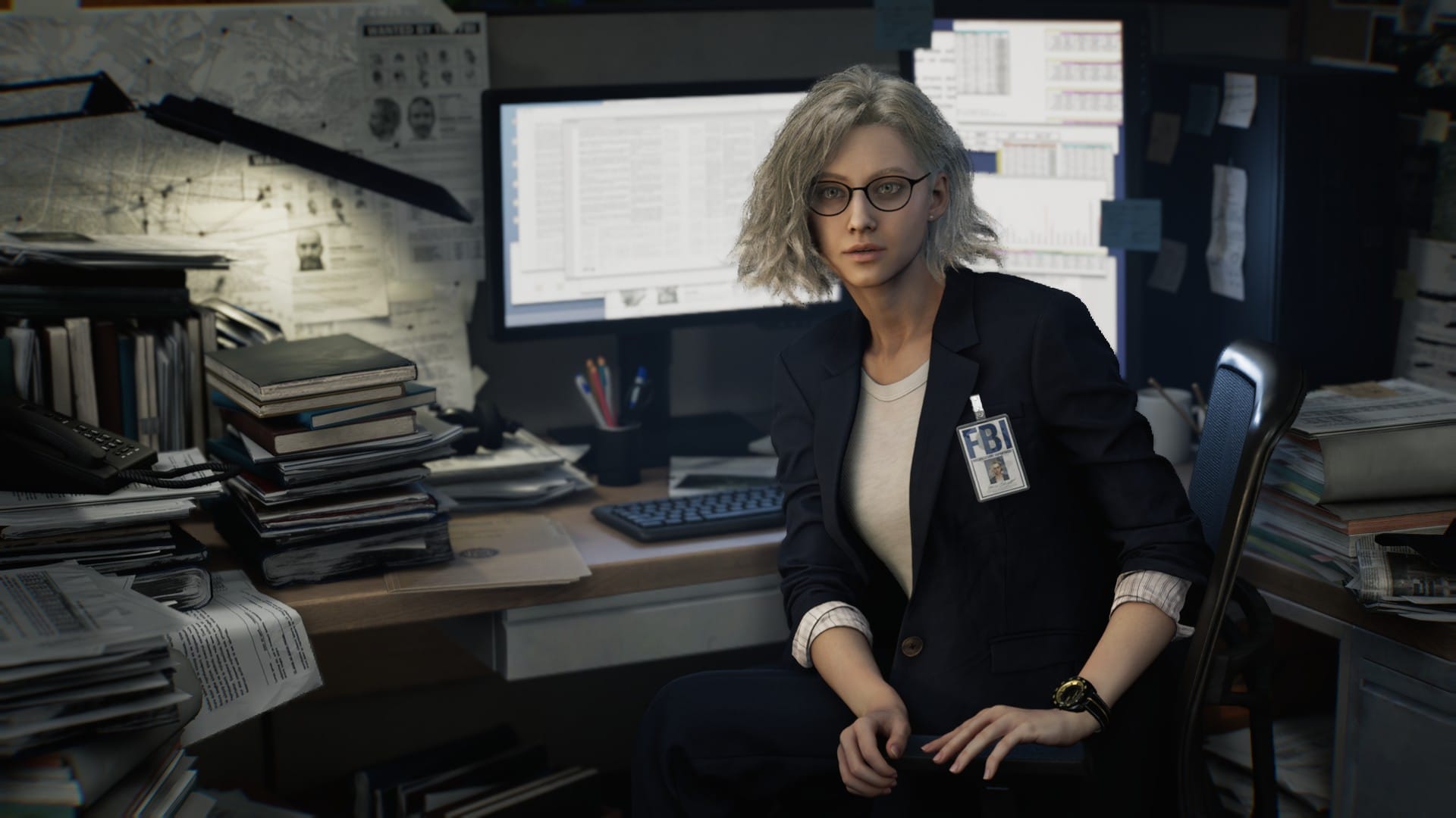 Grace Ashcroft sits turned away from her computer screen at her desk job for the FBI.