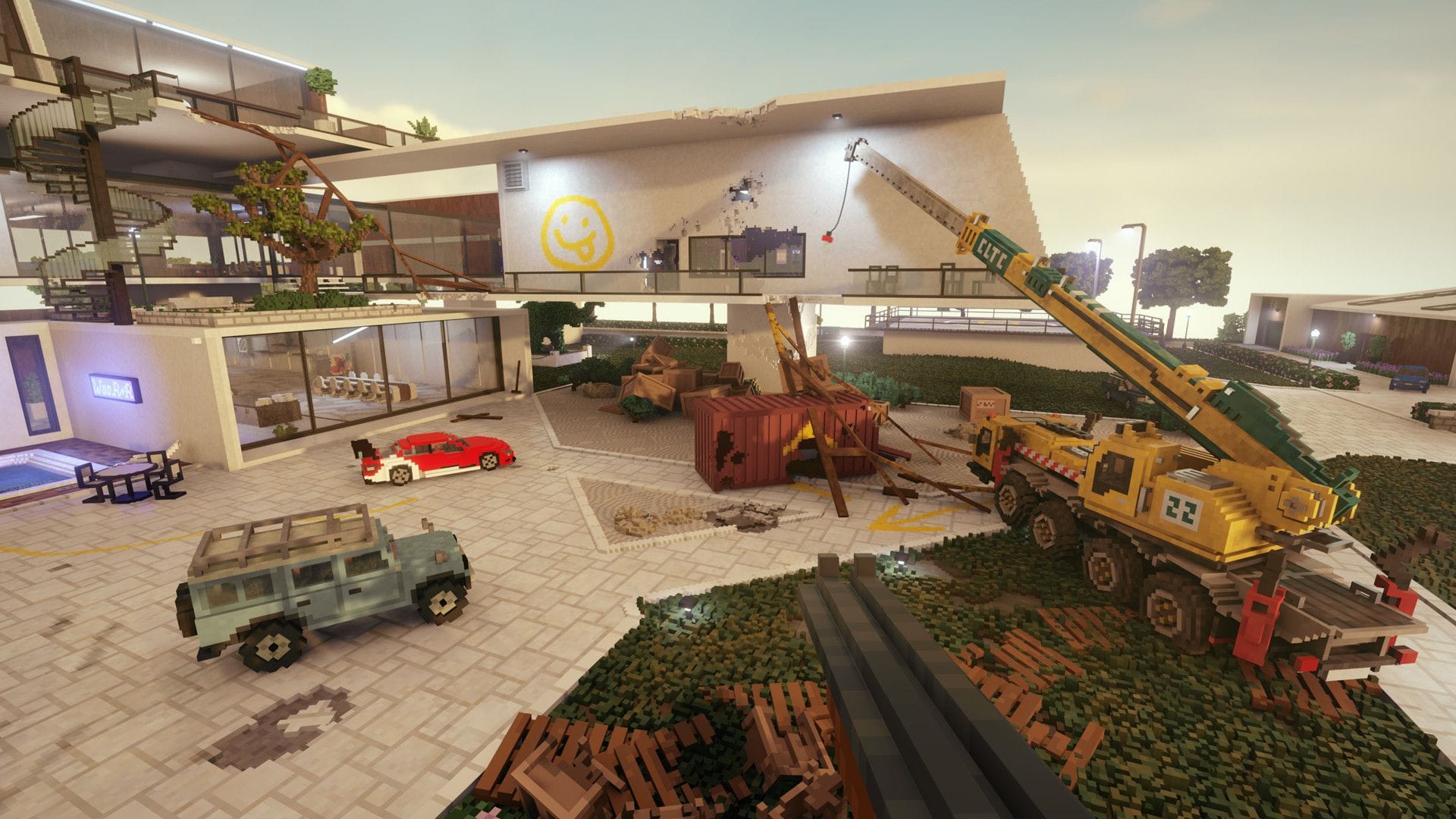 Vehicles crowd the open space outside a fancy villa, including a big yellow crane.