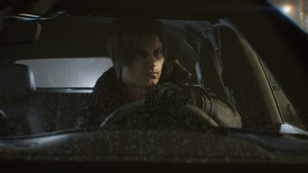 Leon Kennedy behind the wheel of his vehicle, a Porsche.