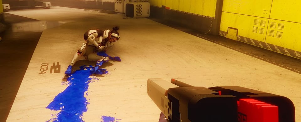 A wounded Marathon character crawls away from the player leaving a trail of bright-blue blood.