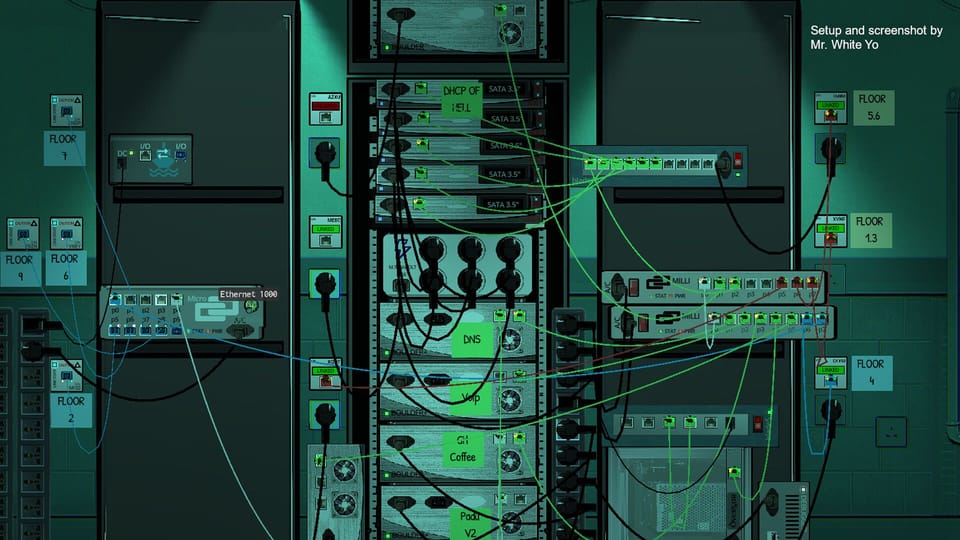An arrangement of routers, servers, switches, and other computer equipment, all connected by criss-crossing wires.
